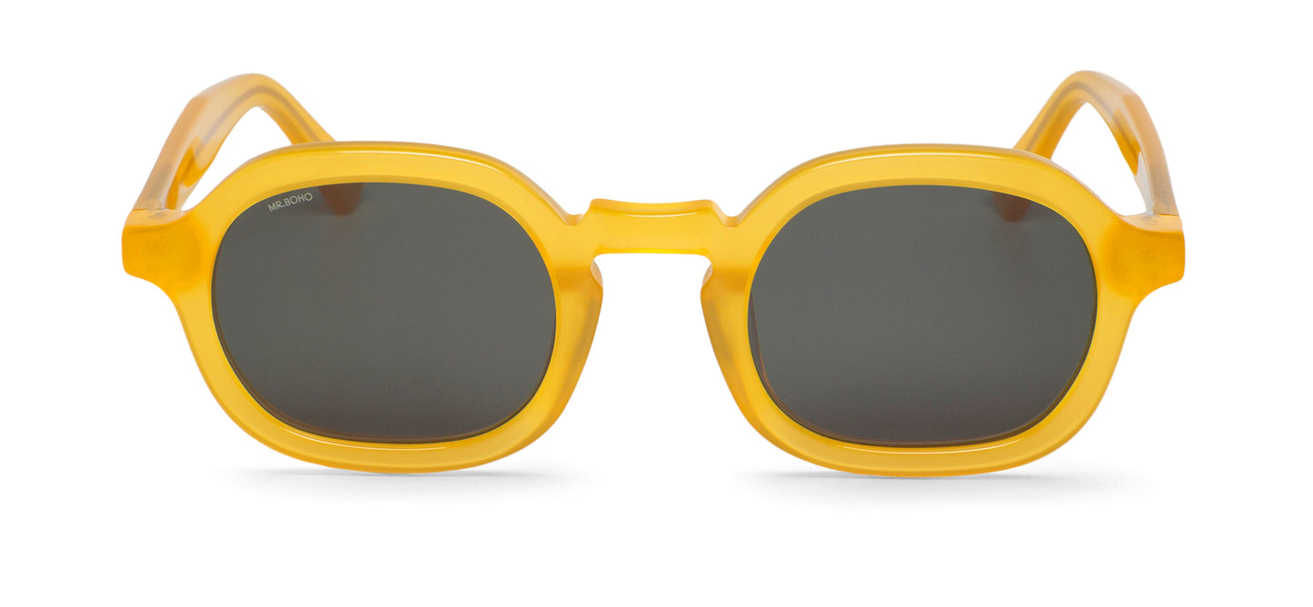 A pair of yellow-framed oval sunglasses with dark lenses.