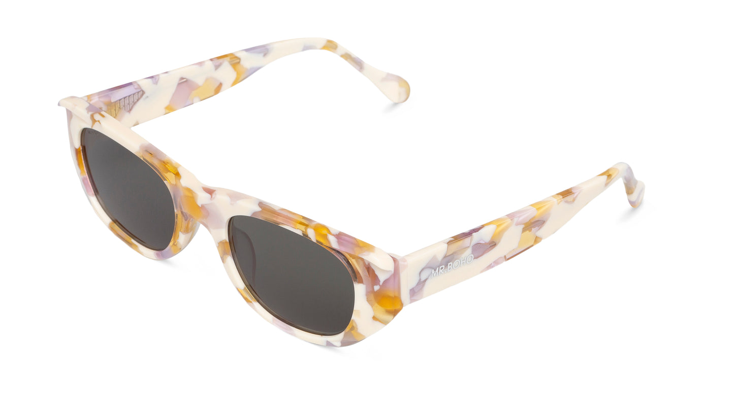 Rectangle with cat eye framed sunglasses in lilac/cream mosaic pattern with dark lenses - arial view