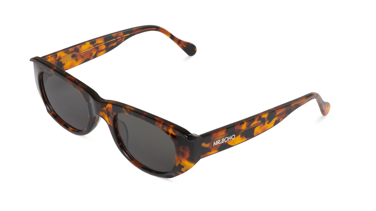 Rectangle with cat eye framed sunglasses in tortoiseshell with dark lenses - arial view