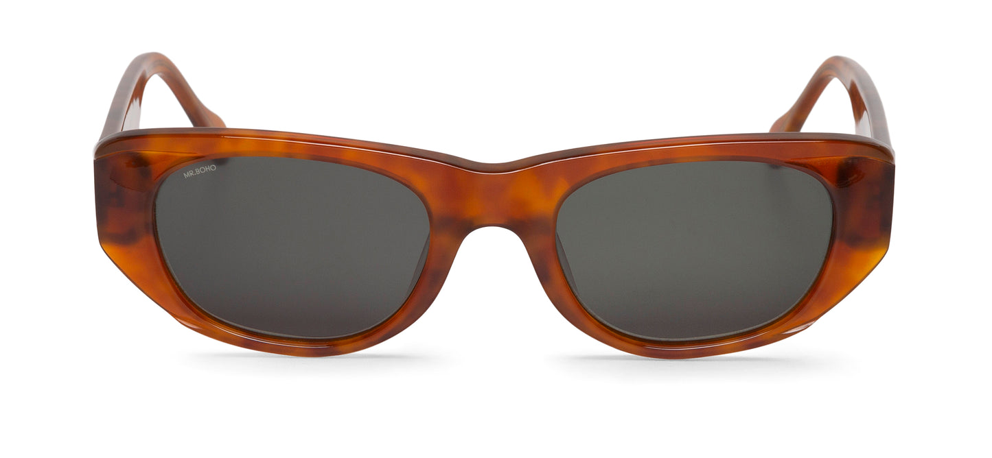 Rectangle with cat eye framed sunglasses in a light tan tortoiseshell with dark lenses
