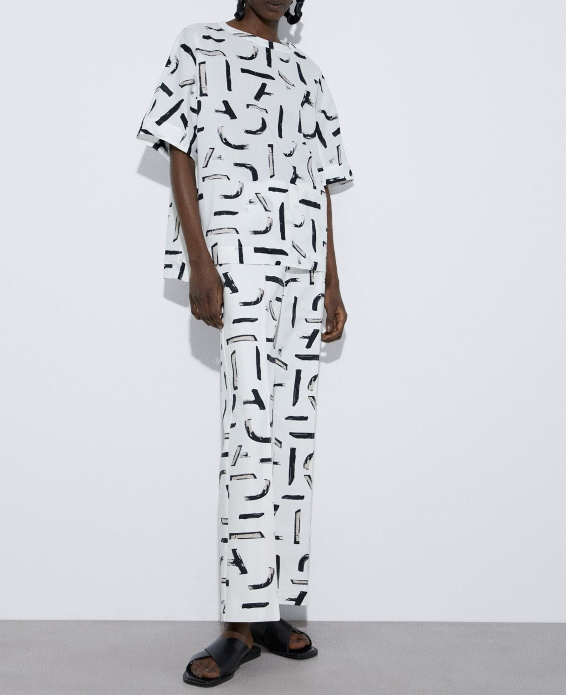 Women Trousers | Black And White Straight Printed Trousers by Spanish designer Adolfo Dominguez