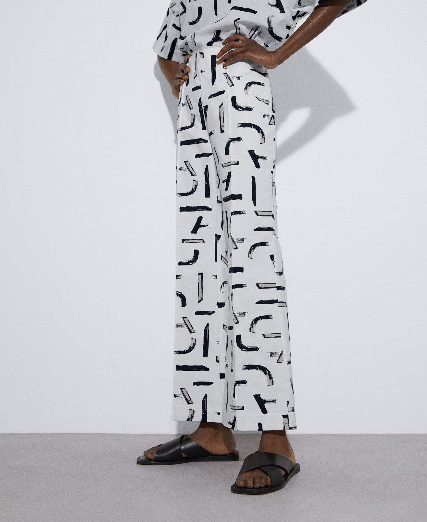 Women Trousers | Black And White Straight Printed Trousers by Spanish designer Adolfo Dominguez