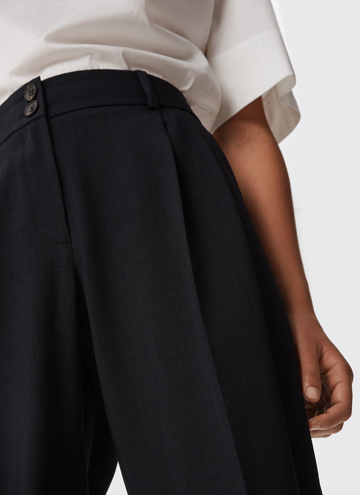Women Trousers | Black Ankle Length Elastic Trousers by Spanish designer Adolfo Dominguez