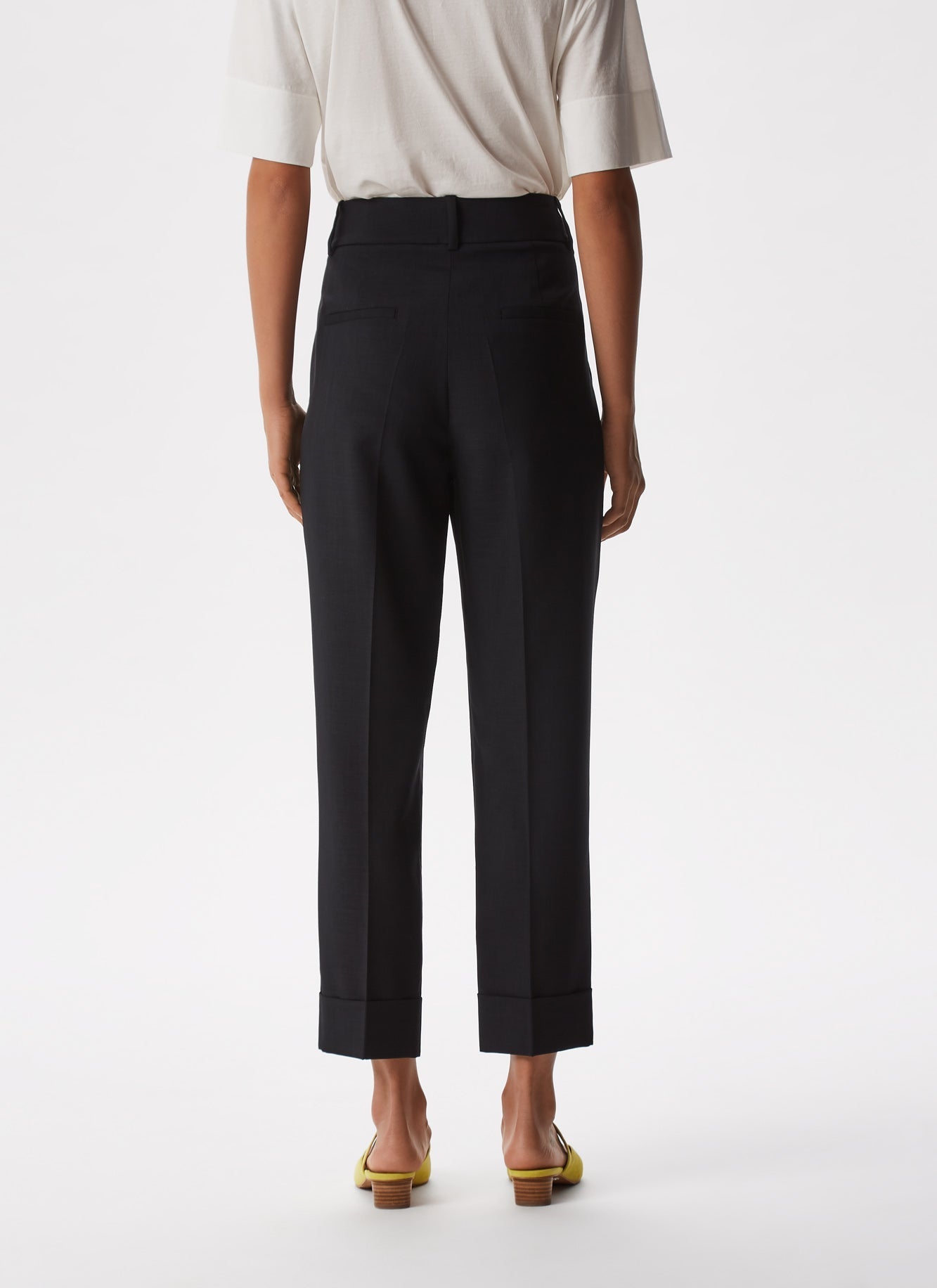 Women Trousers | Black Ankle Length Elastic Trousers by Spanish designer Adolfo Dominguez