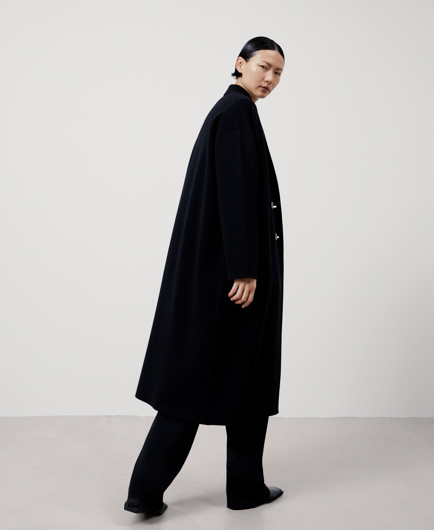 Women Coat | Black Lapel Knitted Coat by Spanish designer Adolfo Dominguez