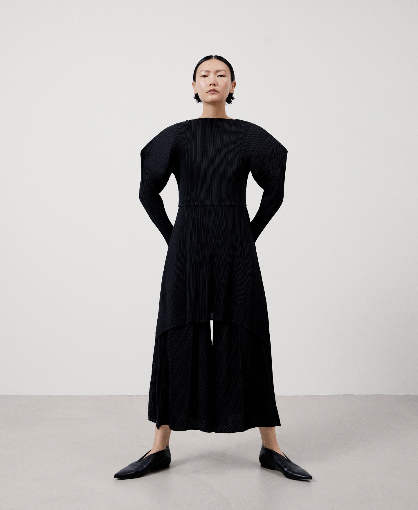 Women Trousers | Black Loose Crinkle Trousers by Spanish designer Adolfo Dominguez