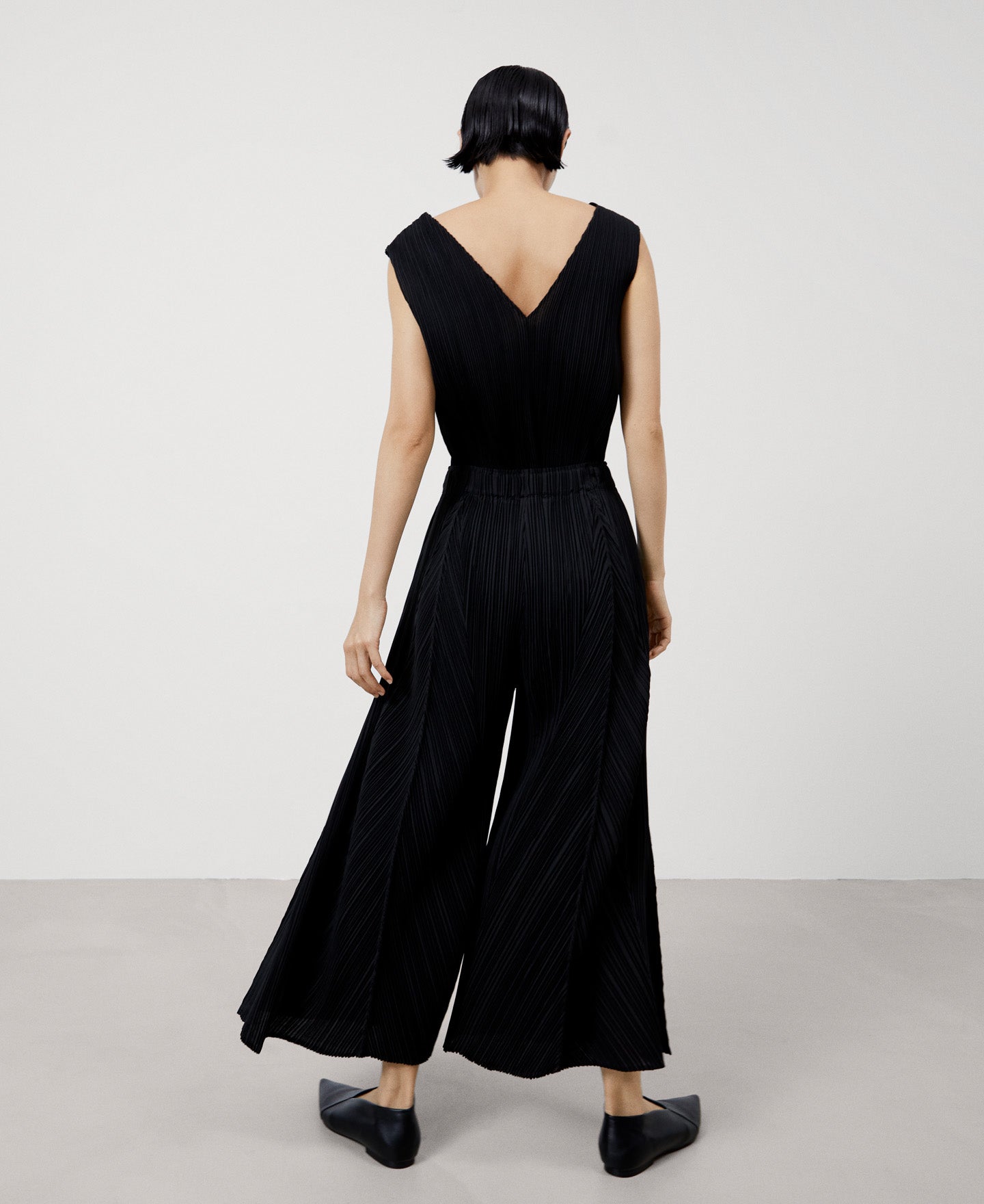 Women Trousers | Black Loose Crinkle Trousers by Spanish designer Adolfo Dominguez
