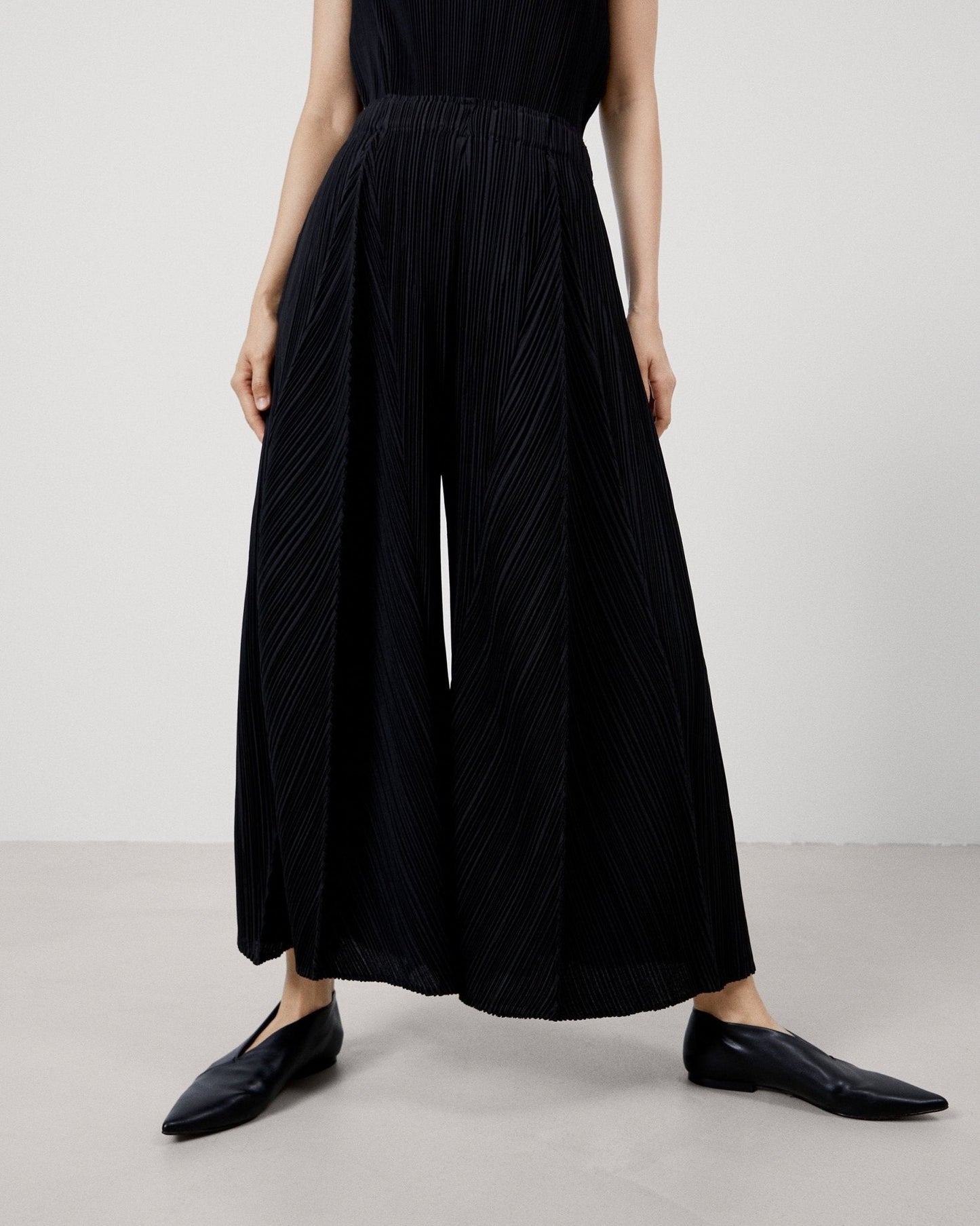 Women Trousers | Black Loose Crinkle Trousers by Spanish designer Adolfo Dominguez