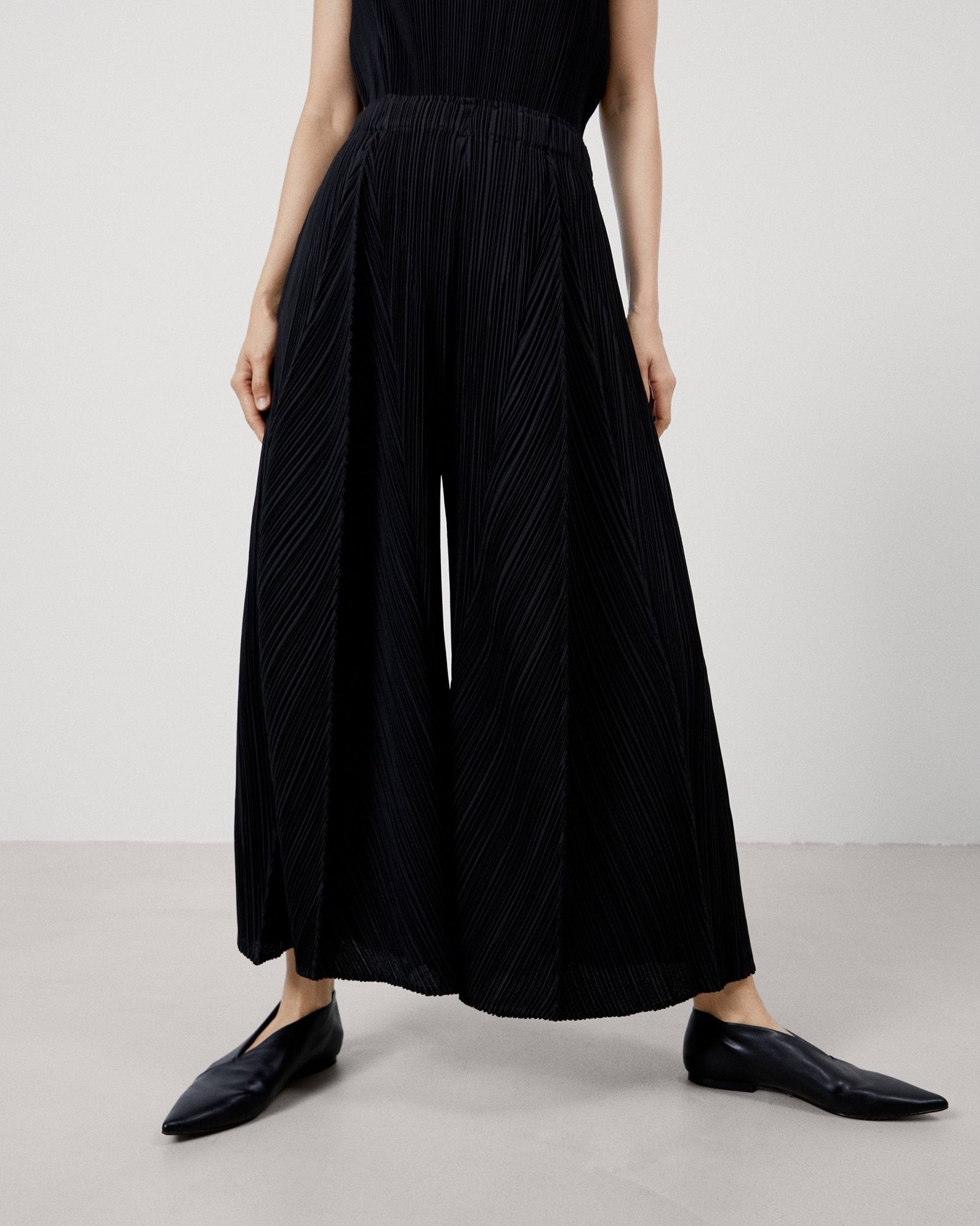Women Trousers | Black Loose Crinkle Trousers by Spanish designer Adolfo Dominguez