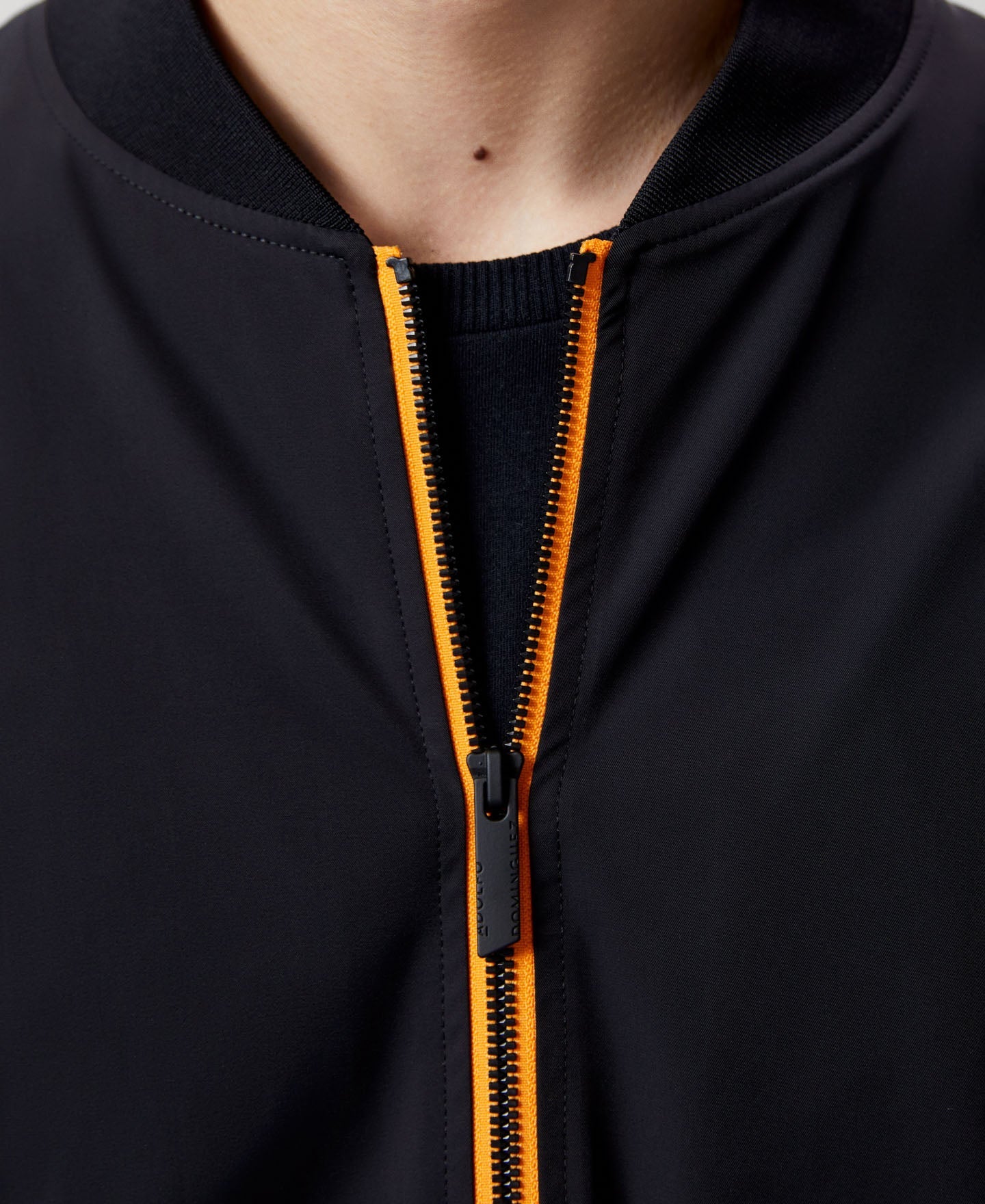 Men Jacket | Black Nylon Bomber With Backpack by Spanish designer Adolfo Dominguez