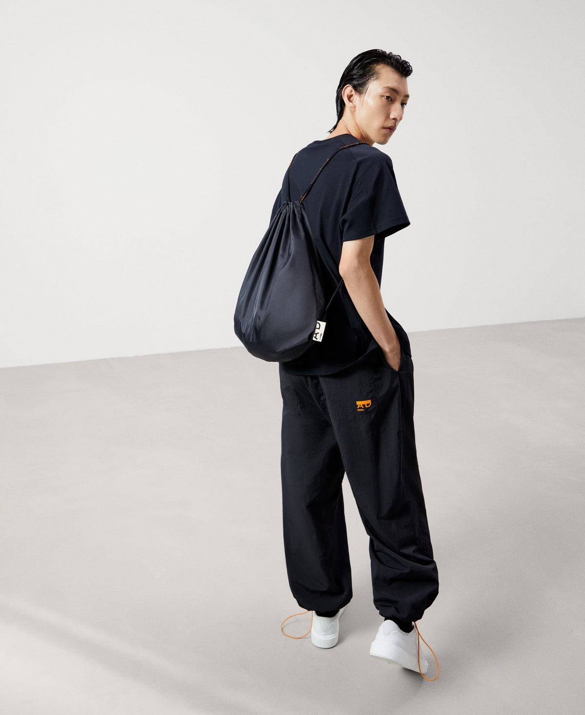 Men Jacket | Black Nylon Bomber With Backpack by Spanish designer Adolfo Dominguez