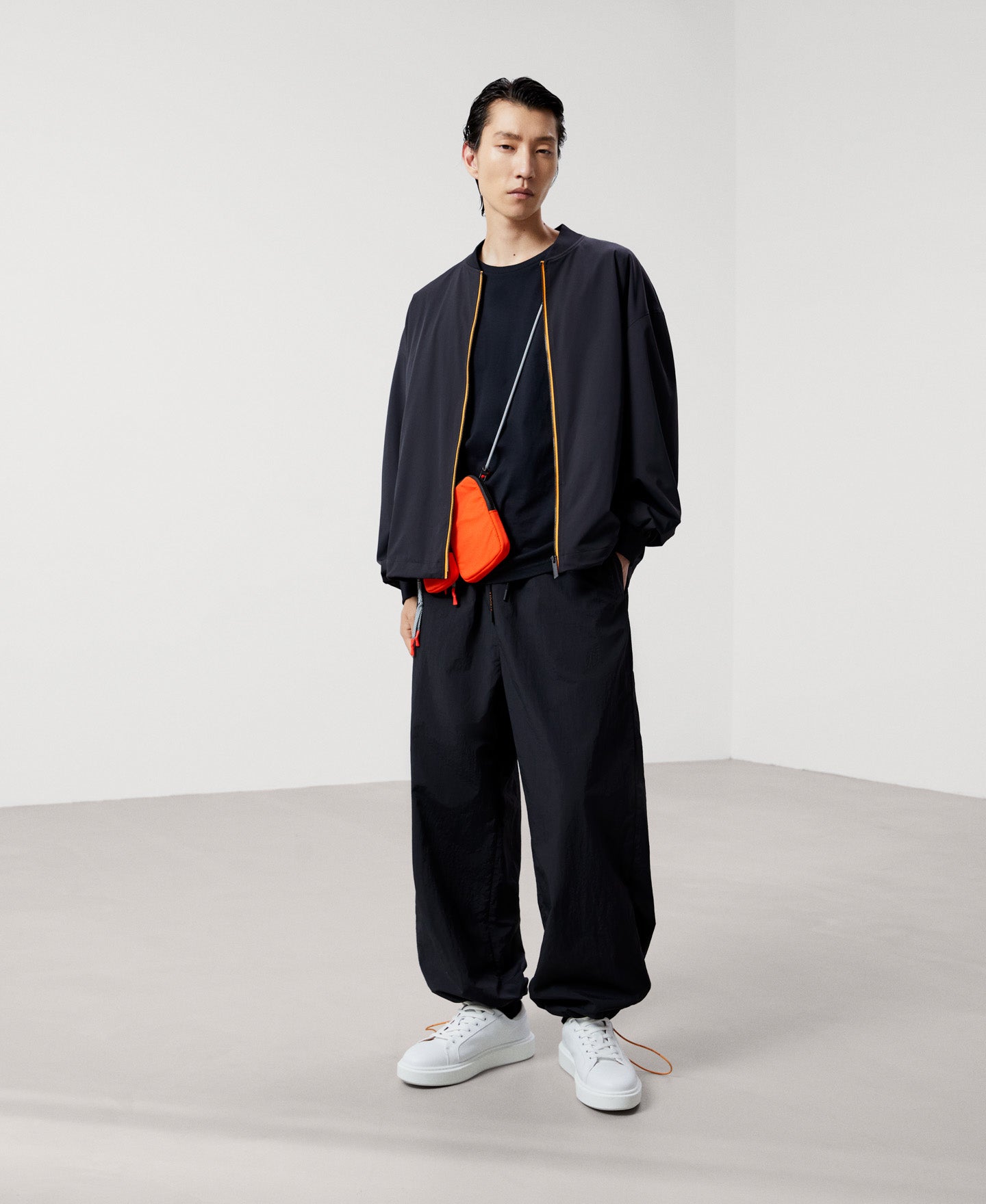 Men Jacket | Black Nylon Bomber With Backpack by Spanish designer Adolfo Dominguez