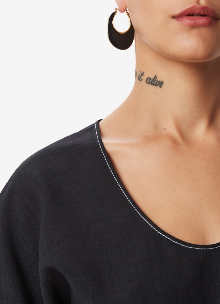 Women Short Sleeved Shirt | Black Shirt With Visible Stitching And Belt by Spanish designer Adolfo Dominguez