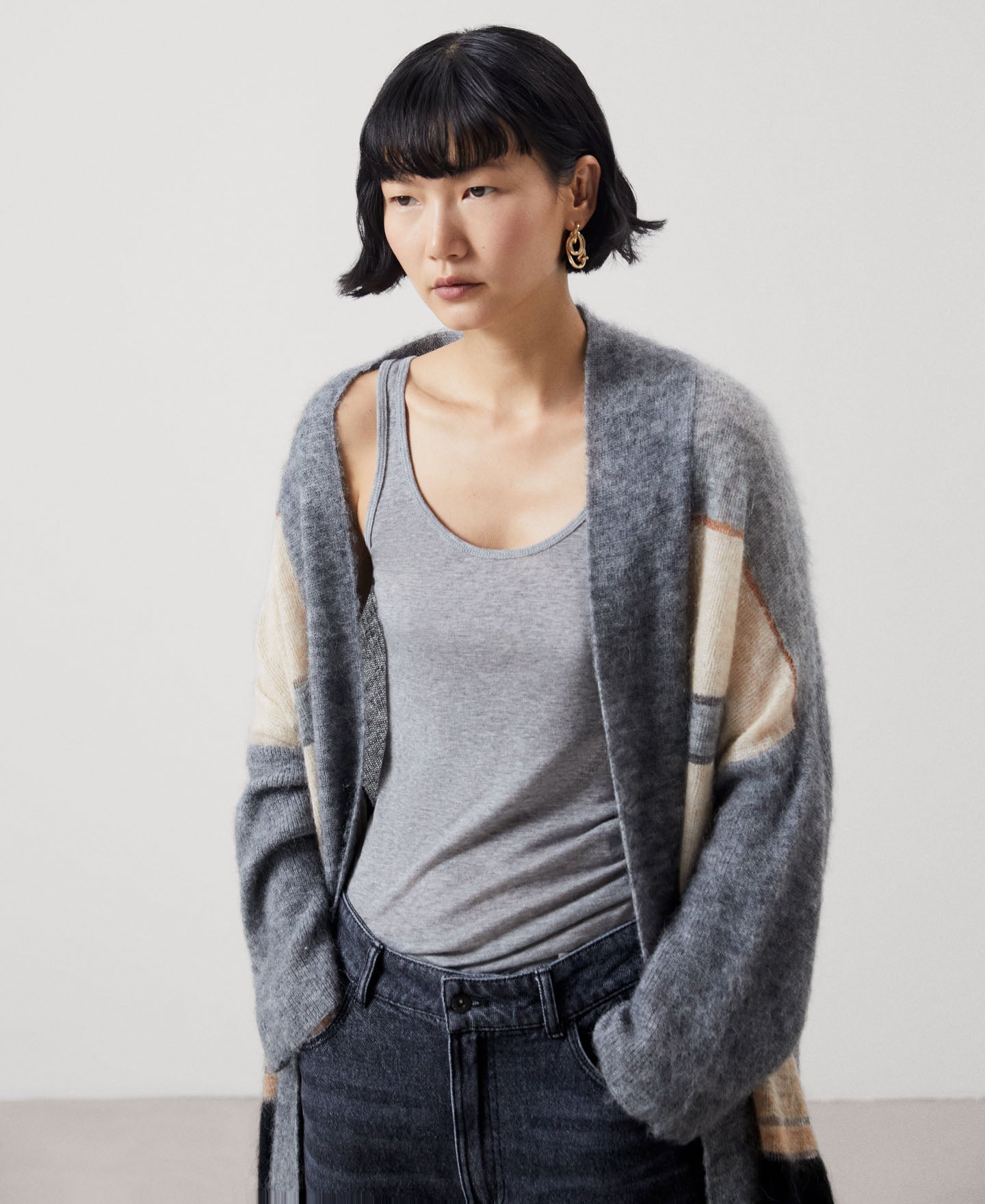 Women Knit Jacket | Black Stripe Two-Tone Wool Knitted Gloves by Spanish designer Adolfo Dominguez