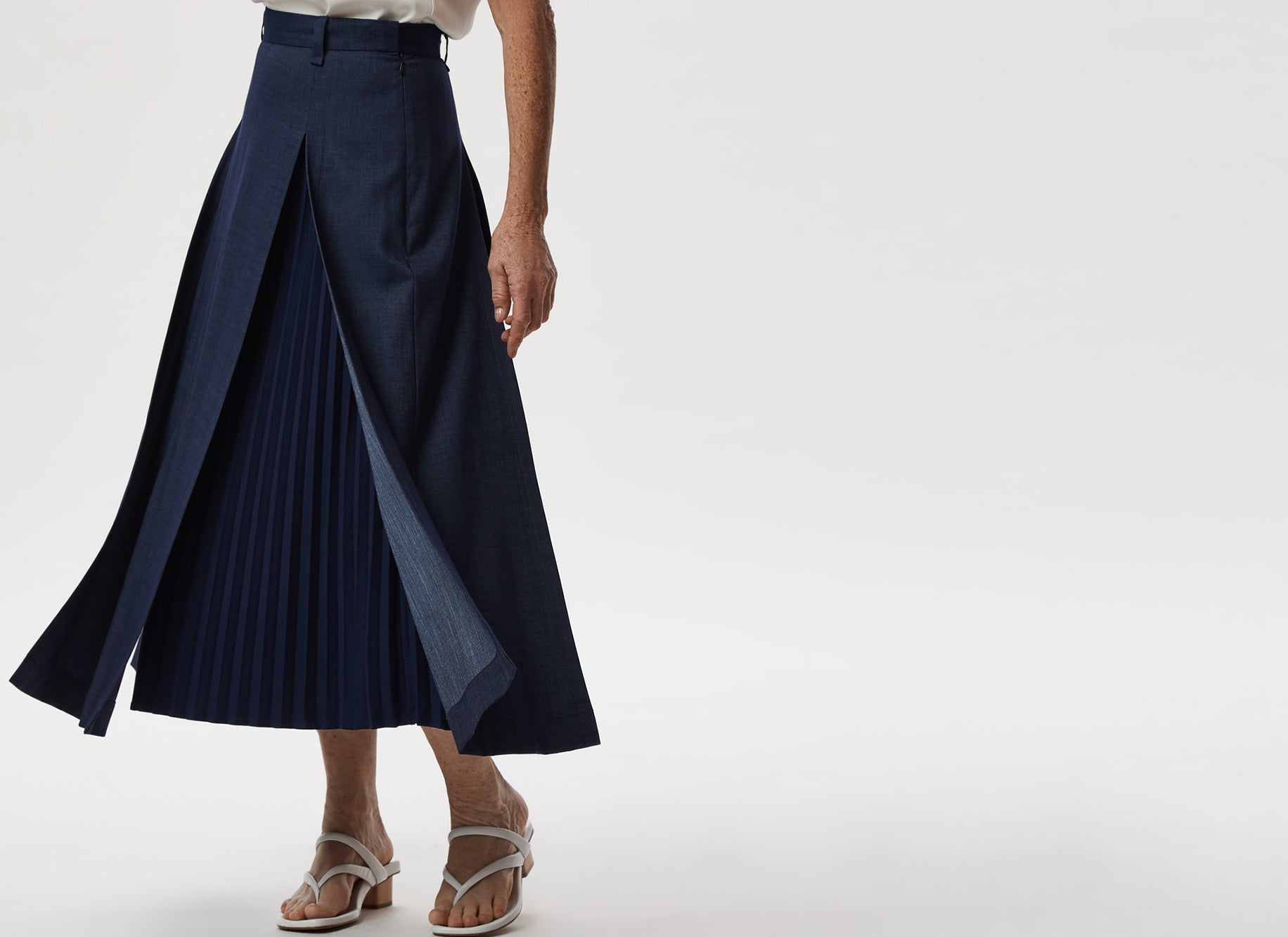 Uncategorised | Blue Pleated Midi Skirt With Overskirt by Spanish designer Adolfo Dominguez