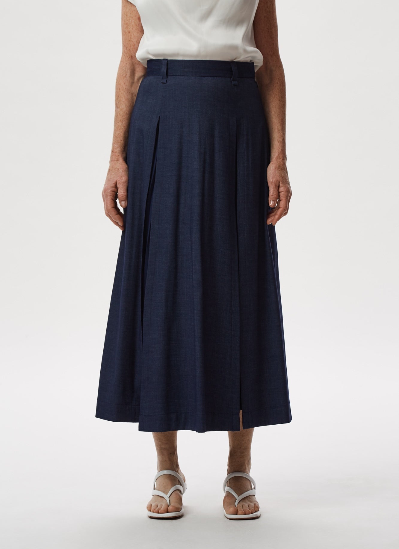 Uncategorised | Blue Pleated Midi Skirt With Overskirt by Spanish designer Adolfo Dominguez