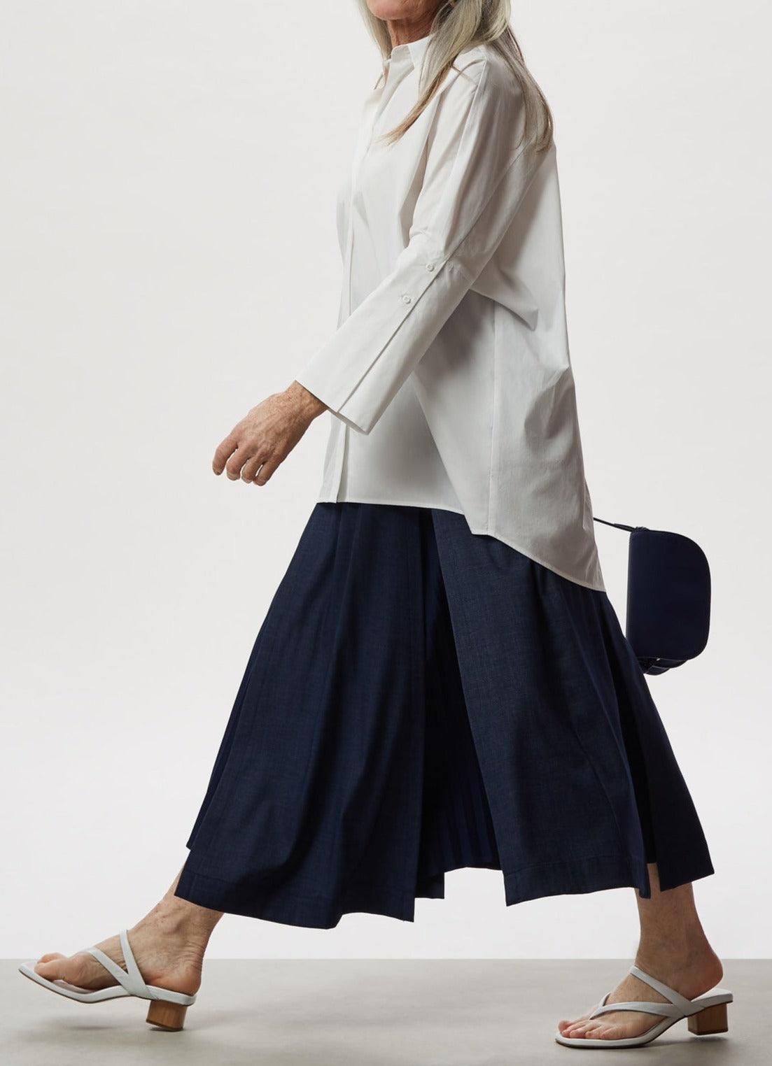 Uncategorised | Blue Pleated Midi Skirt With Overskirt by Spanish designer Adolfo Dominguez