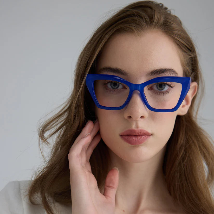 Woman wearing blue cat eye framed glasses