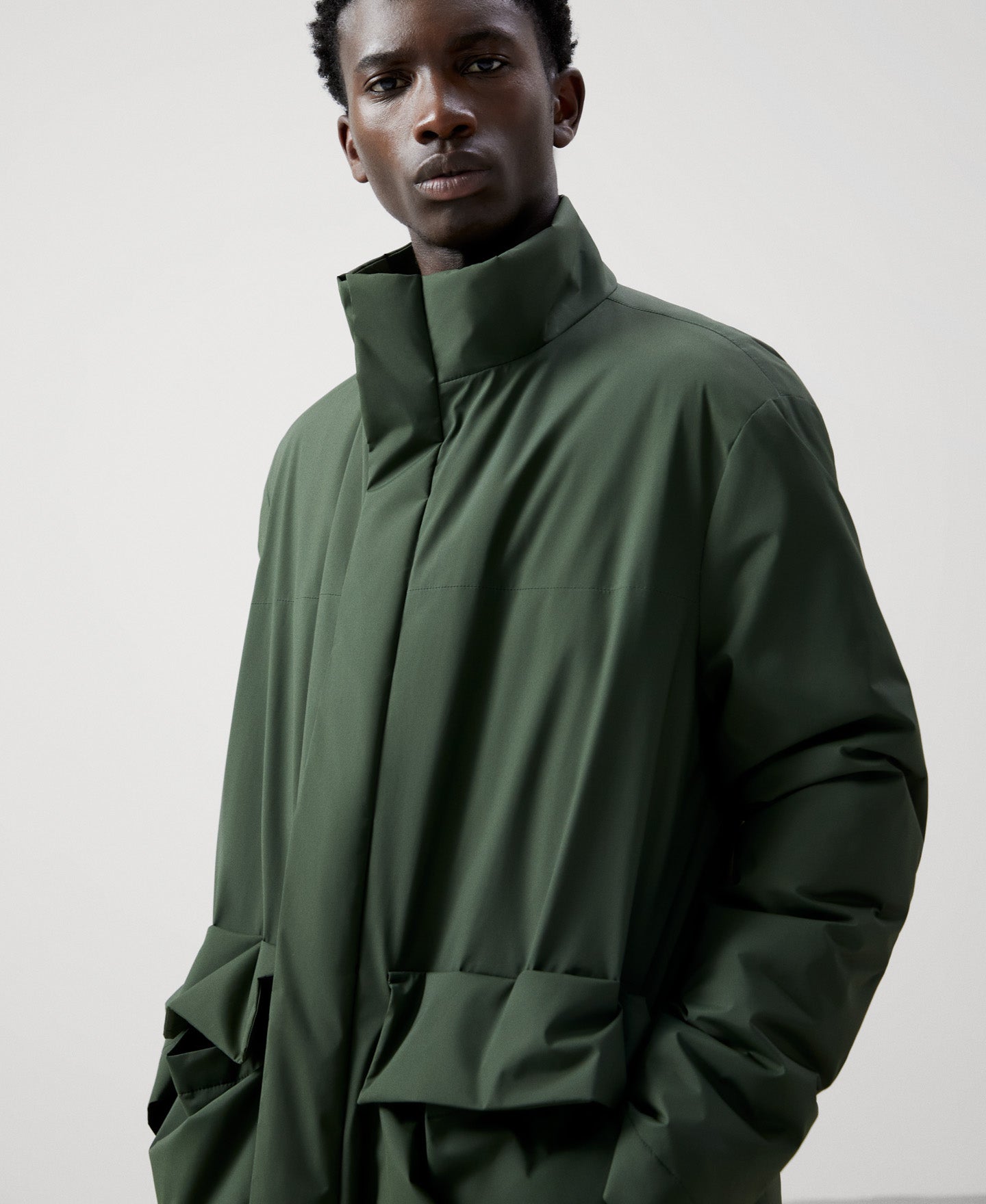 Men Long Jacket | Bottle Green Padded Nylon Coat by Spanish designer Adolfo Dominguez