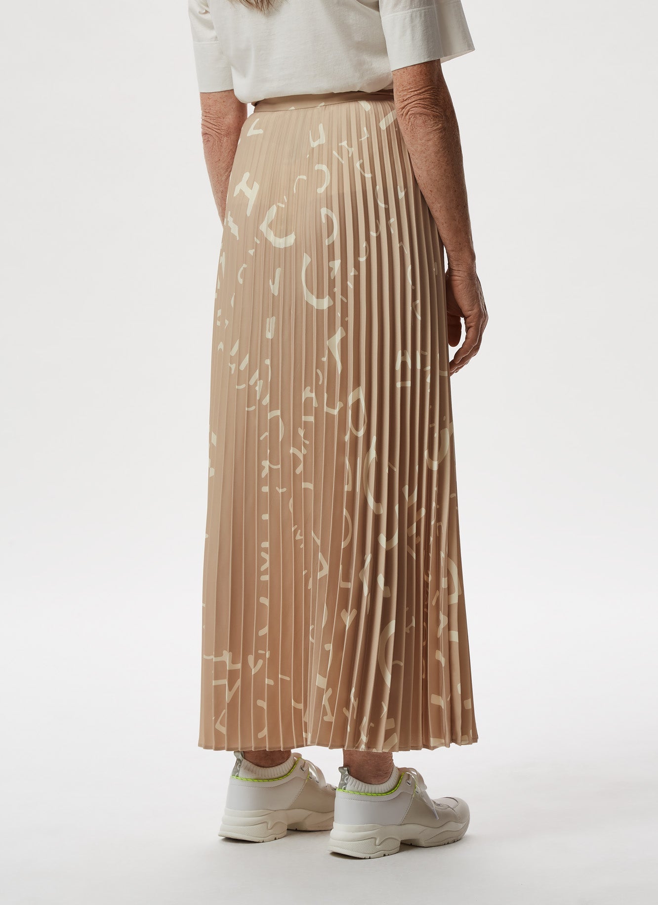 Women Skirt | Camel Stamped Pleated Skirt With Logo Print by Spanish designer Adolfo Dominguez