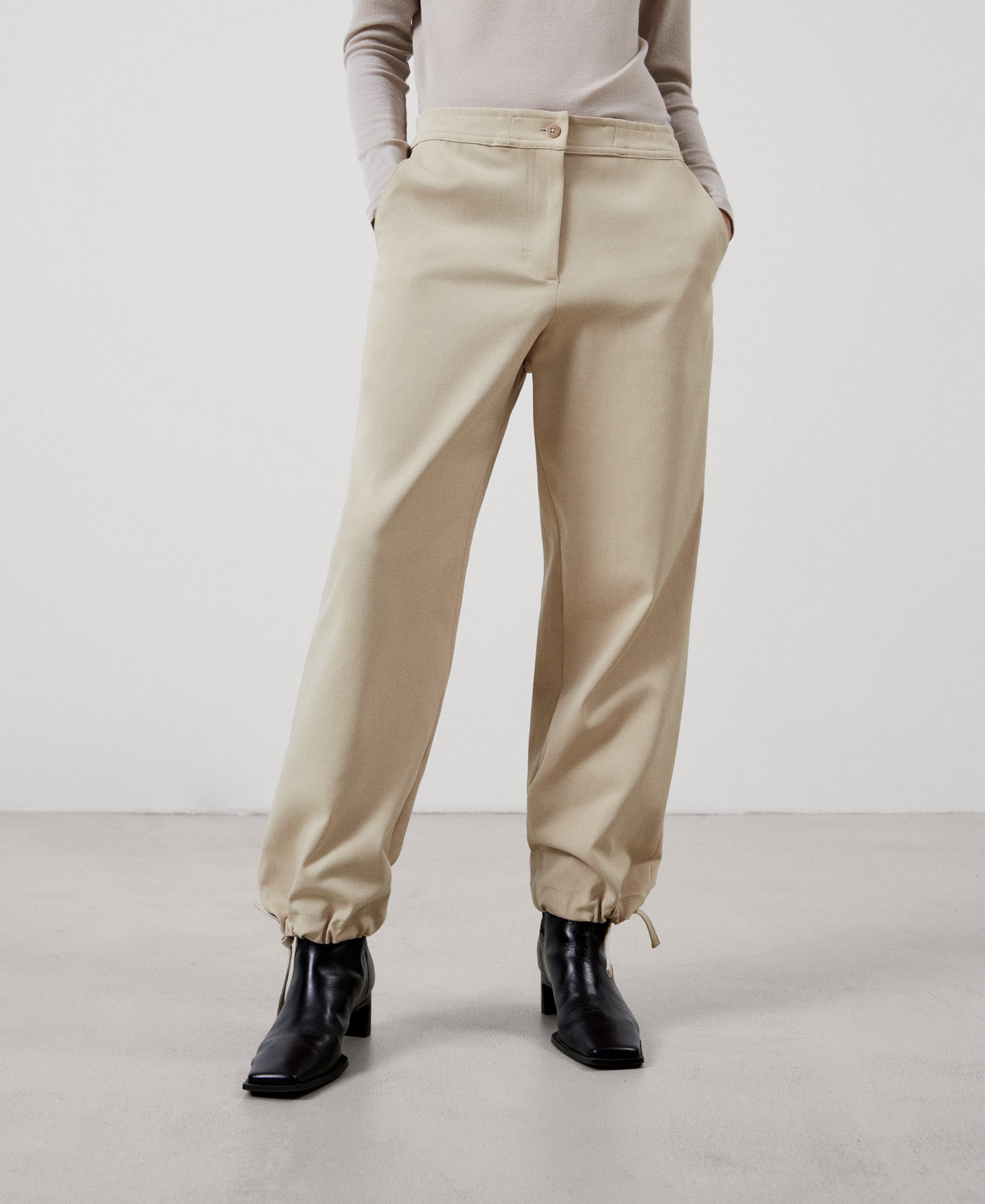 Women Trousers | Ecru Carrot Fit Cargo Trousers by Spanish designer Adolfo Dominguez