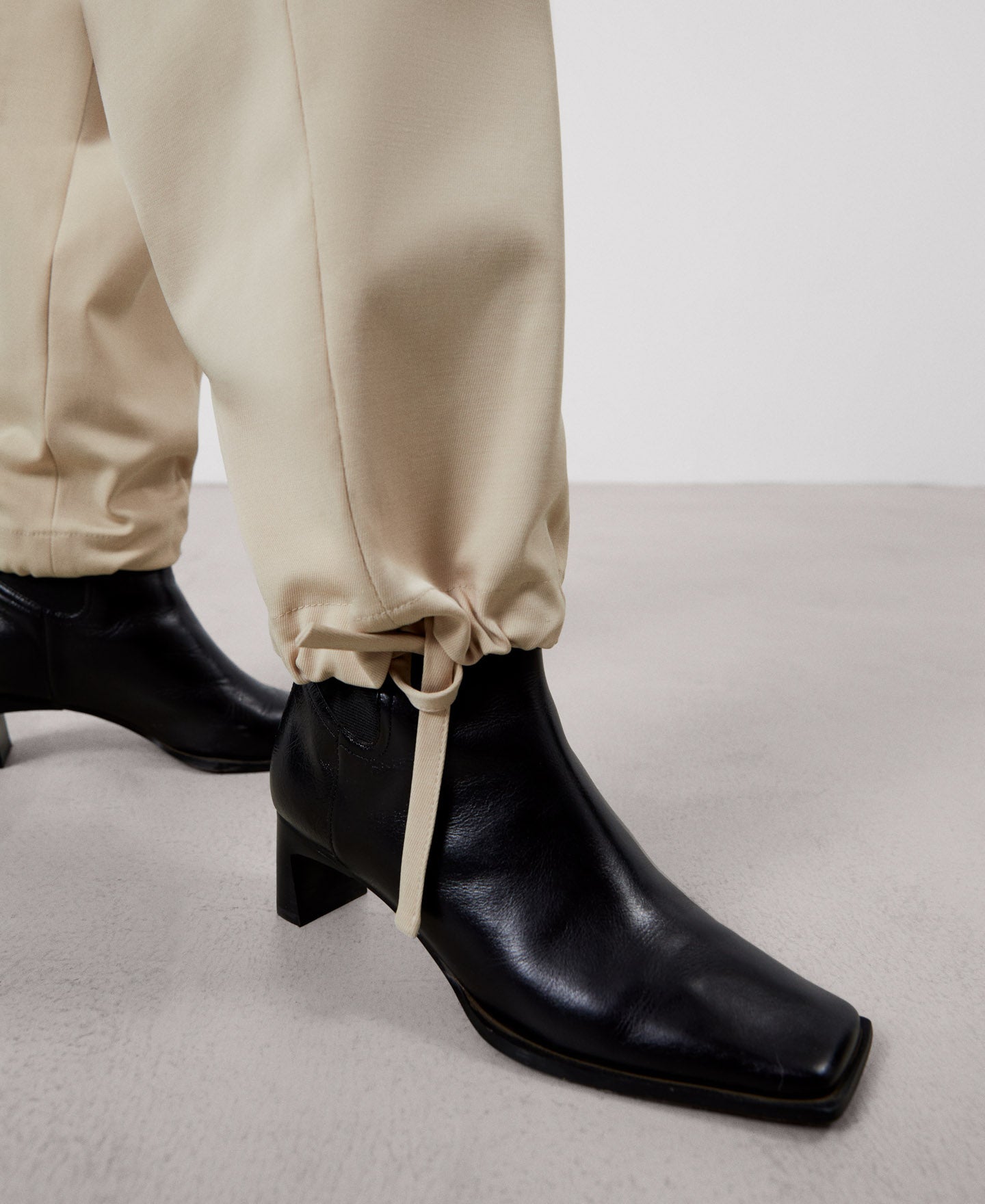 Women Trousers | Ecru Carrot Fit Cargo Trousers by Spanish designer Adolfo Dominguez
