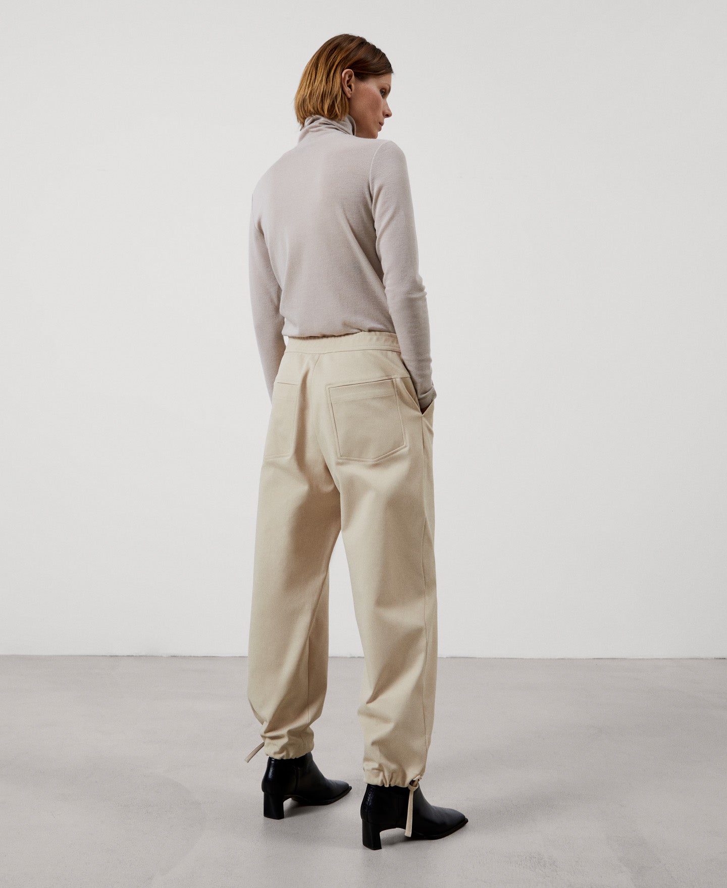 Women Trousers | Ecru Carrot Fit Cargo Trousers by Spanish designer Adolfo Dominguez
