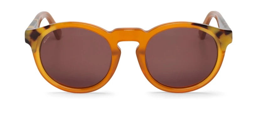 Round sunglasses with tortoiseshell frame and brown lenses on a white background