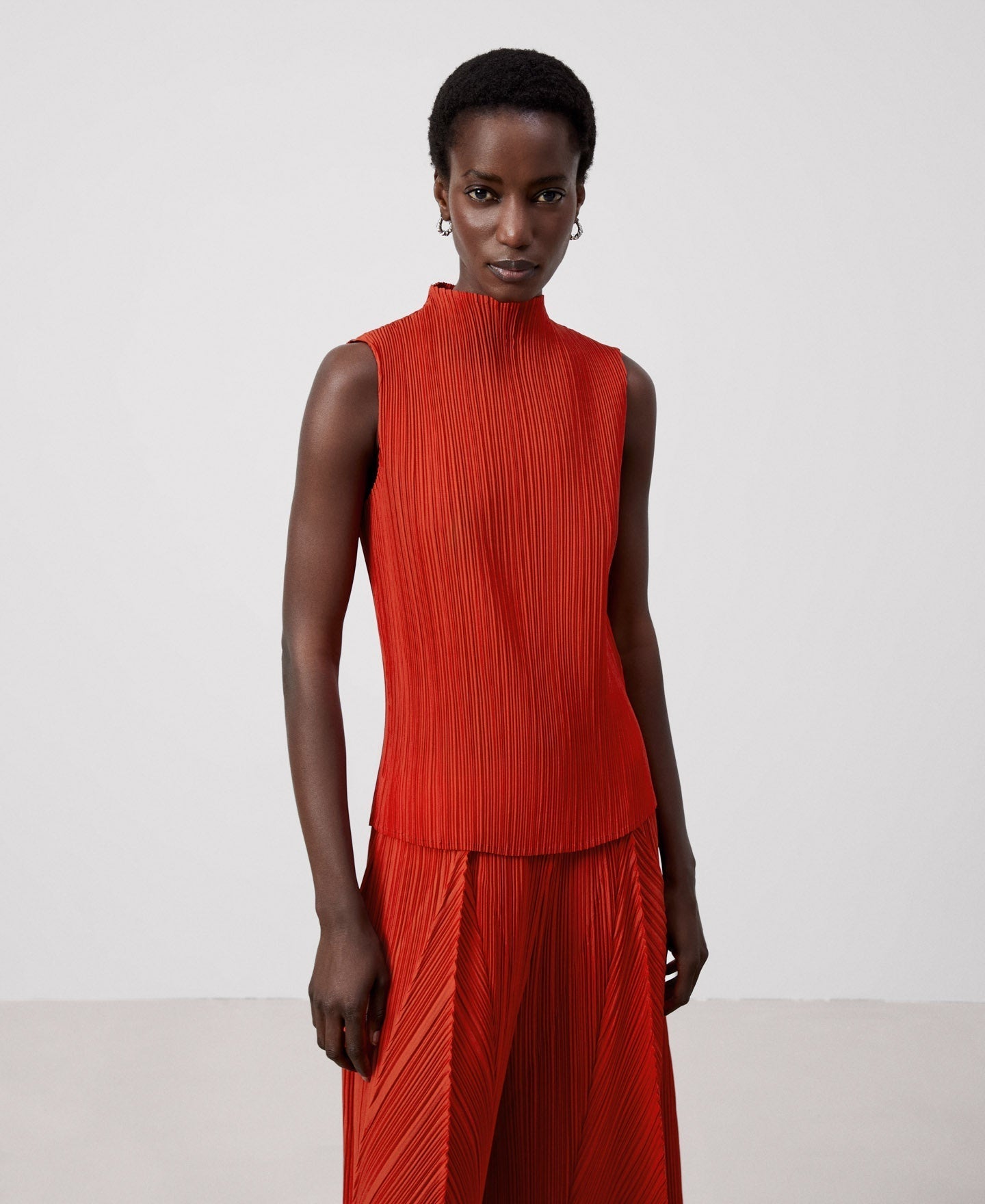 Women Top | Red Crinkle Sleeveless Top by Spanish designer Adolfo Dominguez
