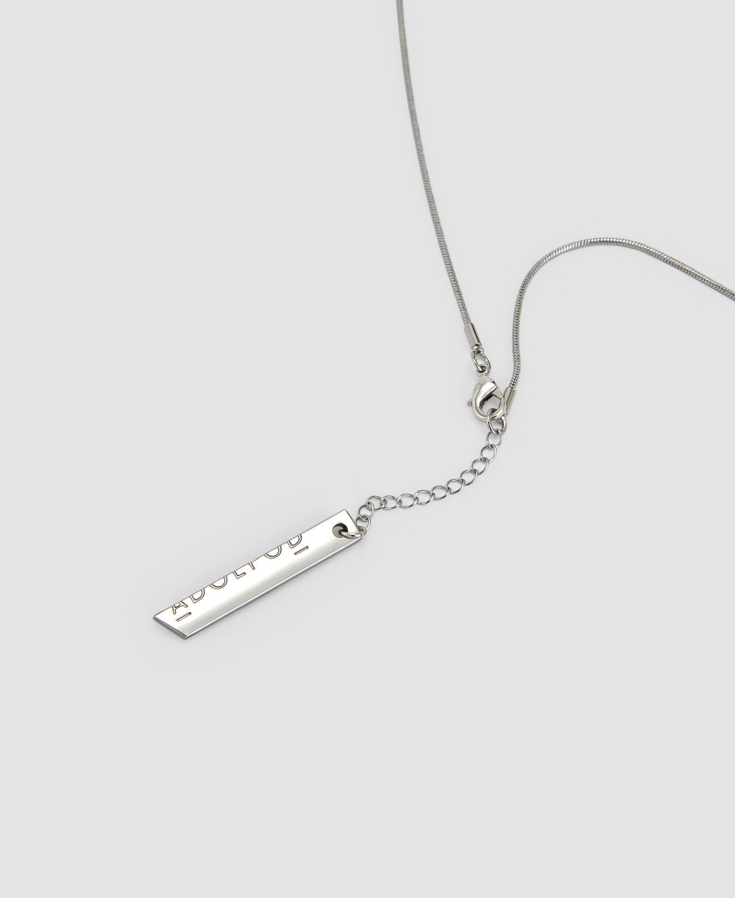 Women Necklace | Red Wood And Zinc Twist Pendant by Spanish designer Adolfo Dominguez