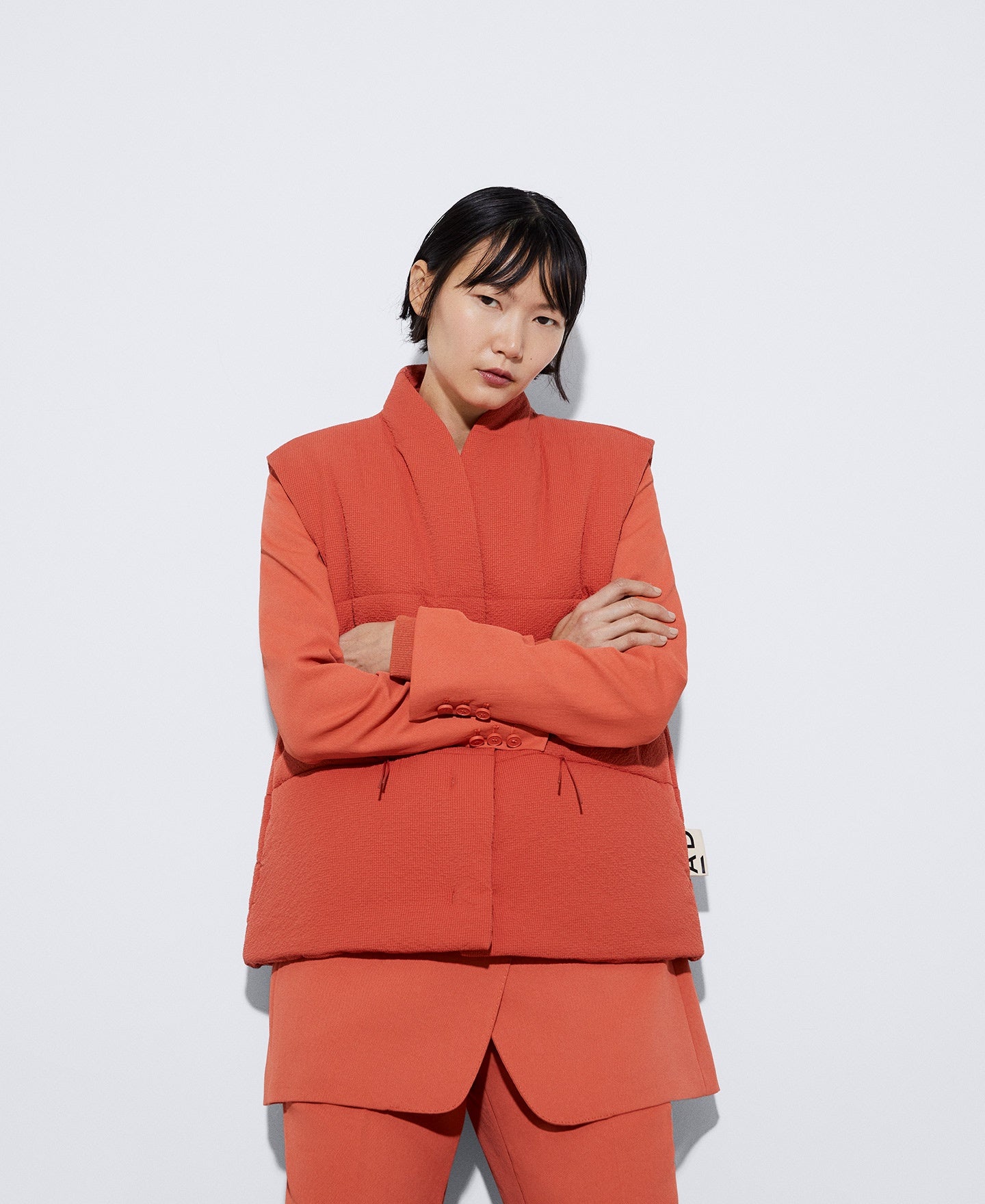 Women Vest | Salmon Polyester Padded Vest by Spanish designer Adolfo Dominguez