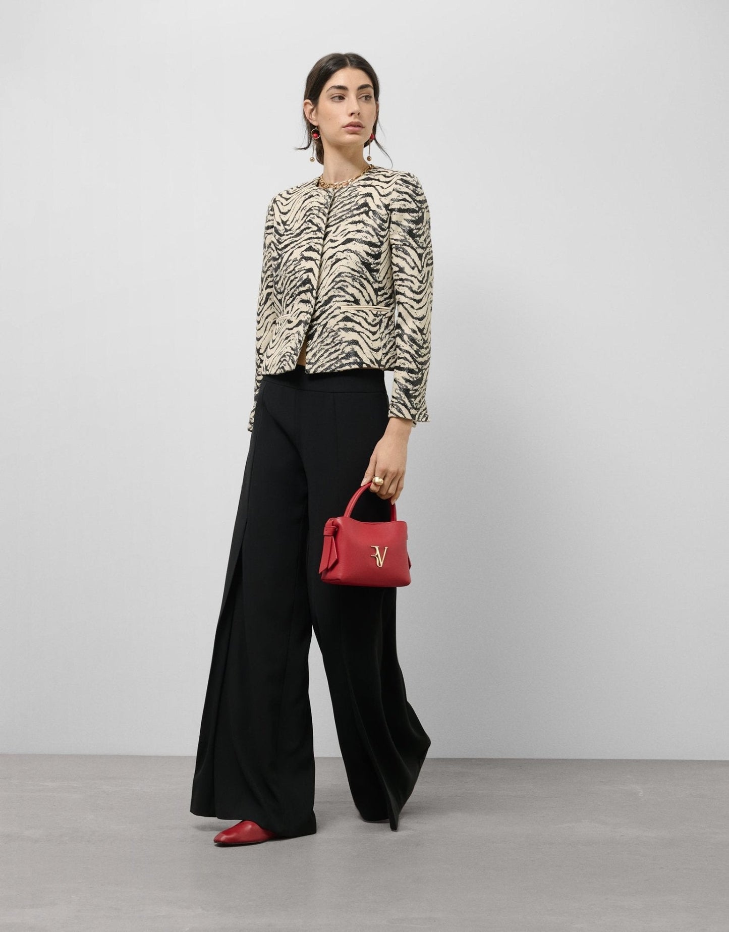 Jackets | Short jacquard jacket with zebra design raffia by Spanish designer Roberto Verino