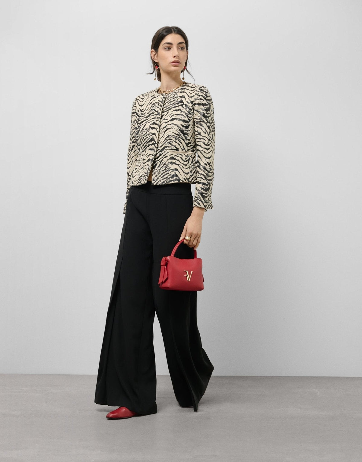 Jackets | Short jacquard jacket with zebra design raffia by Spanish designer Roberto Verino