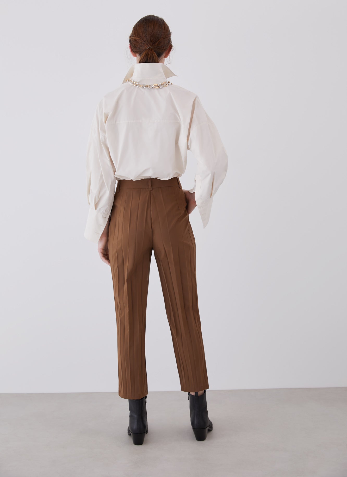 Women Trousers | Toffe Pleated Ankle Length Trousers by Spanish designer Adolfo Dominguez