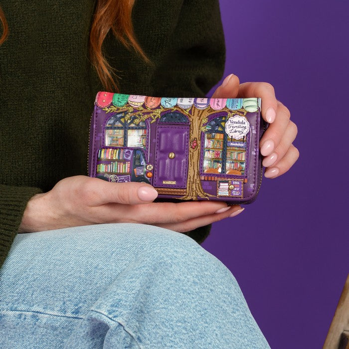 Vendula London Travelling Library Bookshop Medium Ziparound Wallet – model shot