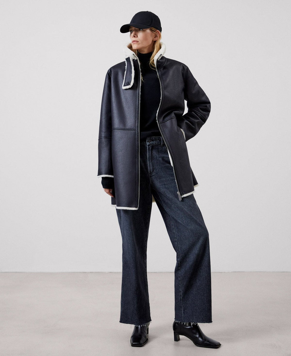 Women Ecoleather | White And Black Leather Textured Jacket by Spanish designer Adolfo Dominguez