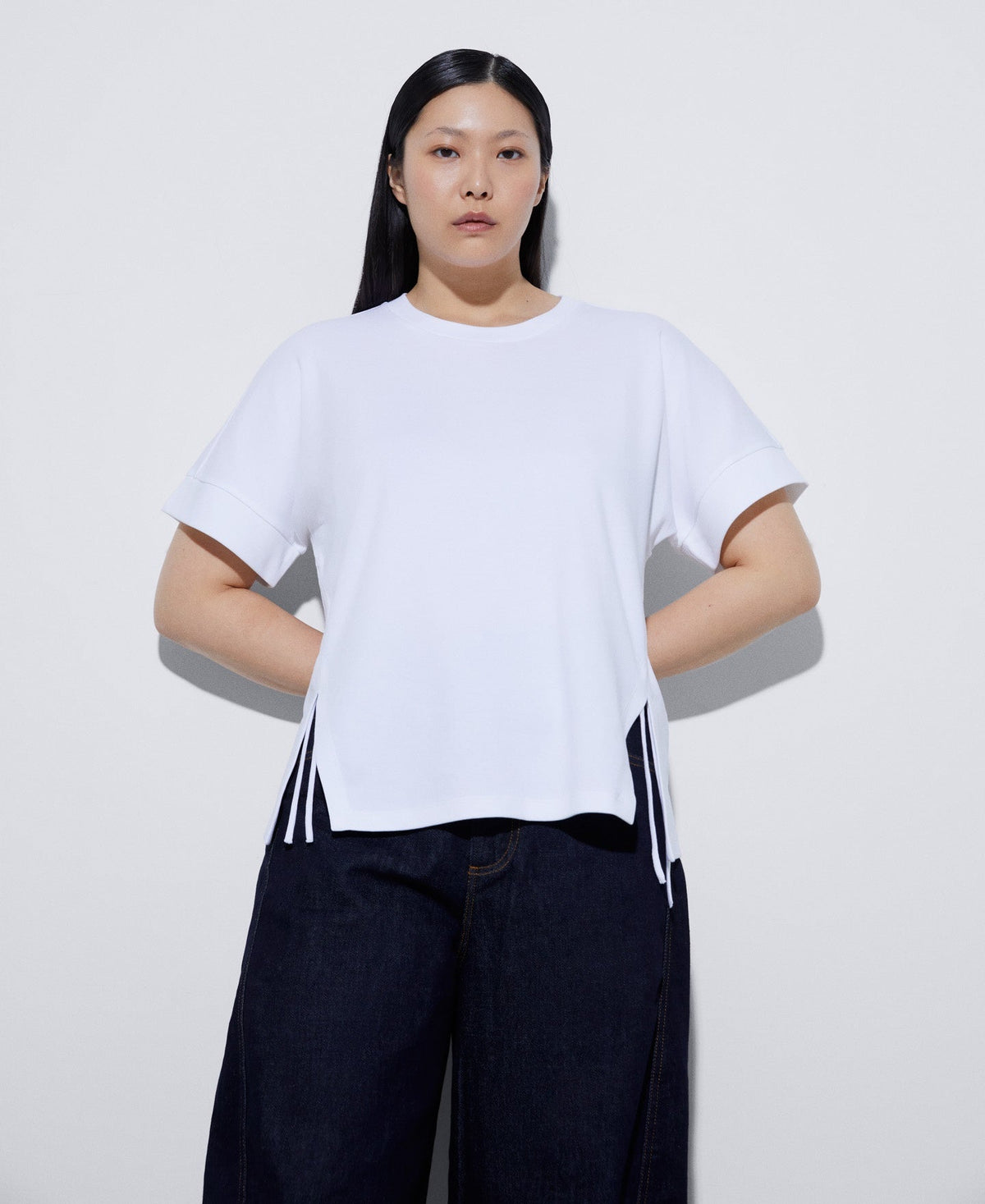 Women T-Shirt (Short Sleeve) | White T-Shirt With Cotton Waistbands by Spanish designer Adolfo Dominguez